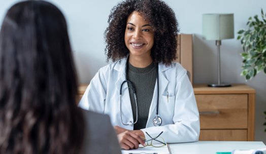 Doctor talking with patient